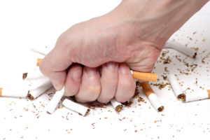 Man trying to give up smoking. Conceptual image.