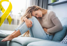 Endométriose, importance des vitamines D et K pendant la thérapeutique ! Femme endométriose avec ruban jaune